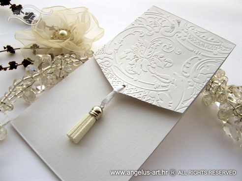 white elegant wedding invitation with fringe