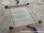 purple invitation for baptism in a form of a scroll