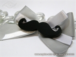 boutonniere for wedding guests with moustaches